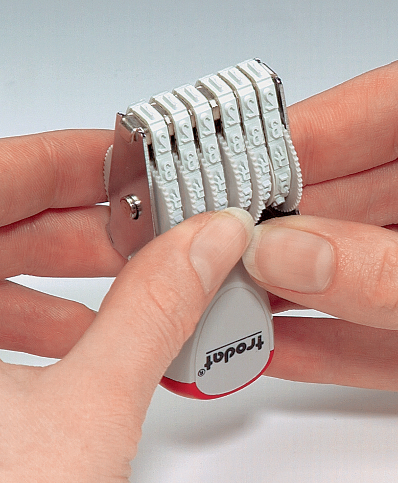 1546_Baender_drehen589347e0c098f trodat Ziffernstempel, 6-stellig, Abdruckmaße: 5 x 27 mm